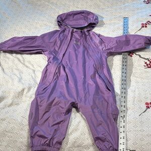 REI 2T rainsuit in purple gently used. One piece rainsuit muck suit.